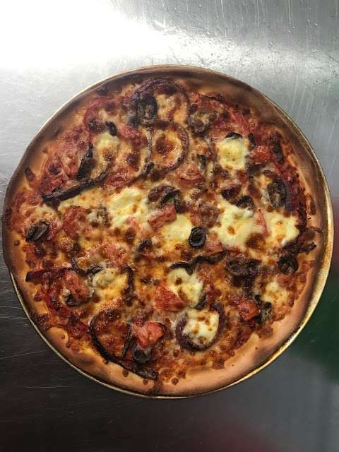 Photo: Pizza Man on High